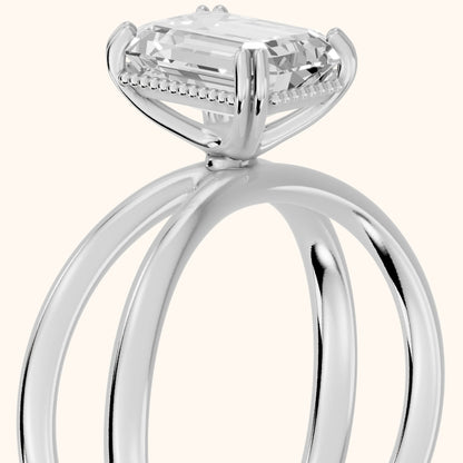 Yvonne Crossover Solitaire Emerald Diamond Engagement Ring in Platinum - slant-view.webp