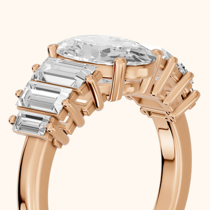 Mara Sidestone Baguette Accent Oval Diamond Engagement Ring in Rose Gold - slant-view.webp