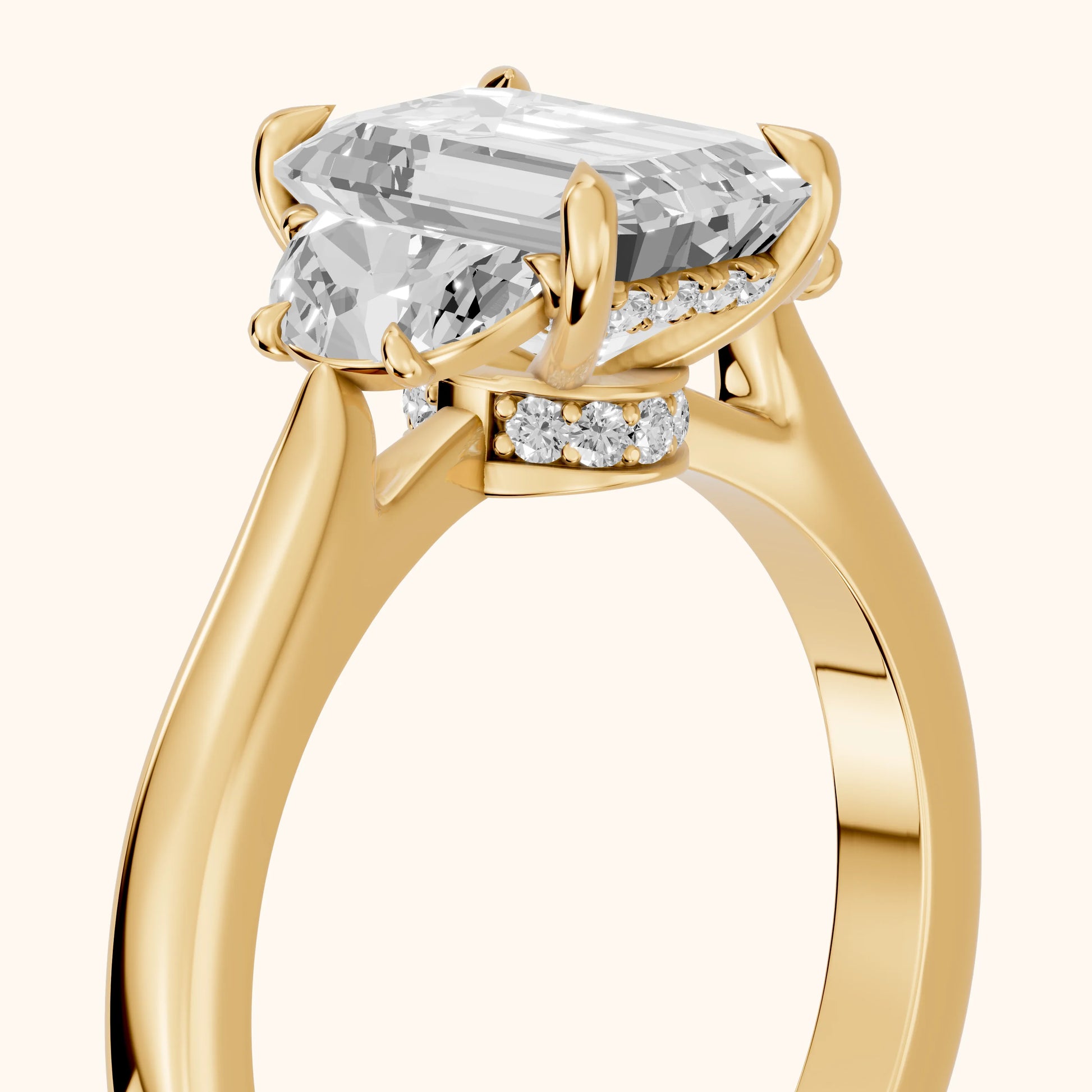 Romy Three-Stone Emerald Diamond Engagement Ring in Yellow Gold - slant-view.webp
