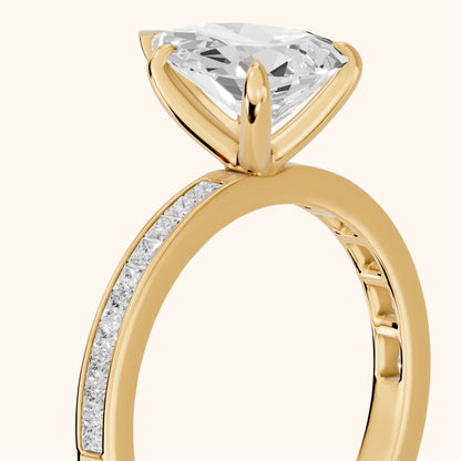 Freja Channel Set Pear Diamond Engagement Ring in Yellow Gold - slant-view.webp