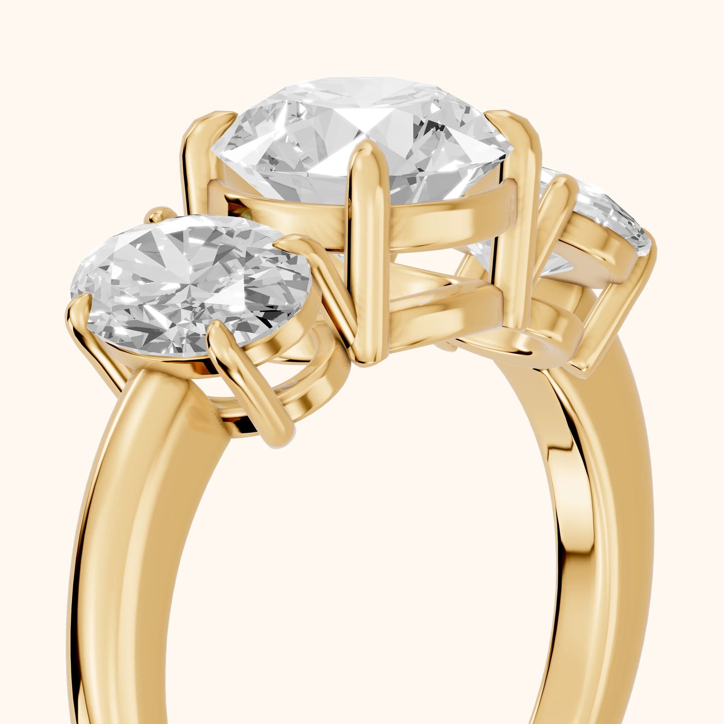 Lila Three-Stone Round Diamond Ring in Yellow Gold - slant-view.webp
