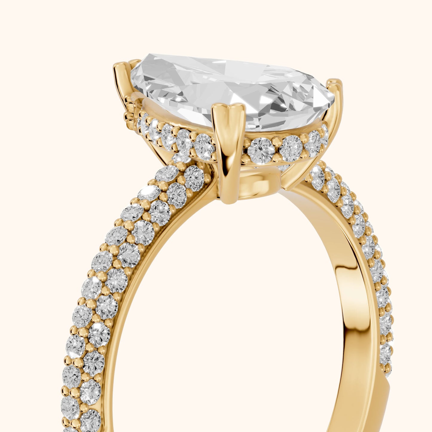 Violet Hidden Halo Pavé Pear Diamond Ring in Yellow Gold - slant-view.webp