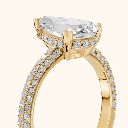 Violet Hidden Halo Pavé Pear Diamond Ring in Yellow Gold - slant-view.webp