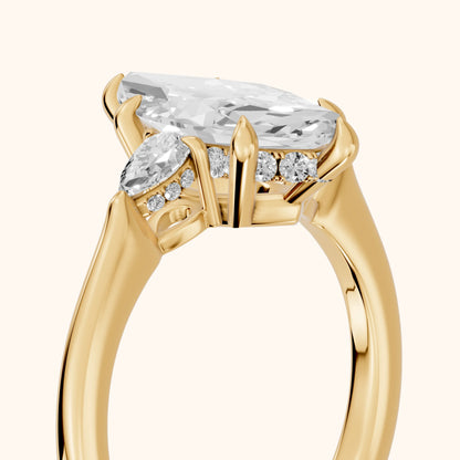 Leila Three-Stone Marquise Diamond Engagement Ring in Yellow Gold - slant-view.webp