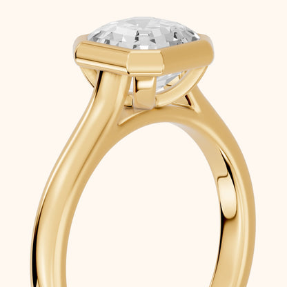 Jolie Bezel Solitaire Asscher Diamond Engagement Ring in Yellow Gold - slant-view.webp