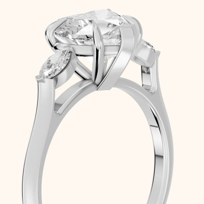 Lyra Three-Stone Heart Diamond Engagement Ring in Platinum - slant-view.webp