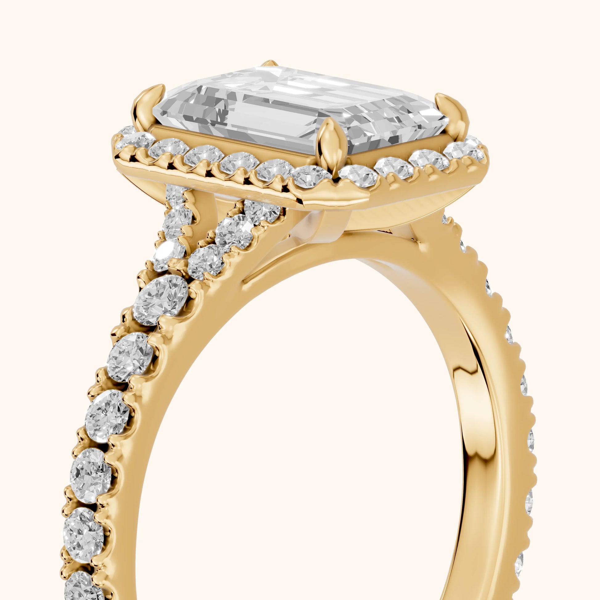 Bella Halo Pavé Emerald Diamond Engagement Ring in Yellow Gold - slant-view.webp