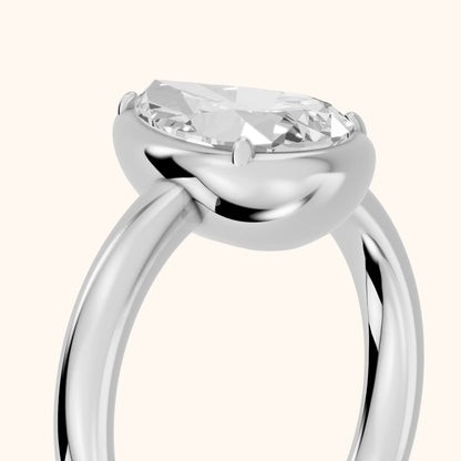 Alina Bezel Solitaire Pear Diamond Ring in Silver - slant-view.webp