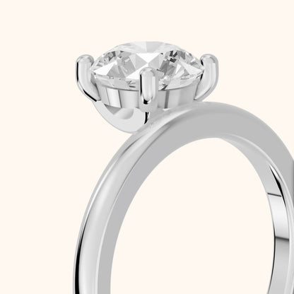 Maisie Four Prong Solitaire Round Diamond Engagement Ring in Silver - slant-view.webp