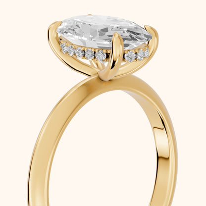Amaya Hidden Halo Oval Diamond Ring in Yellow Gold - slant-view.webp