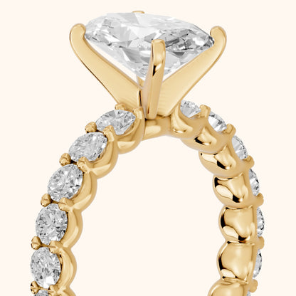 Leta Infinity Pavé Oval Diamond Engagement Ring in Yellow Gold - slant-view.webp