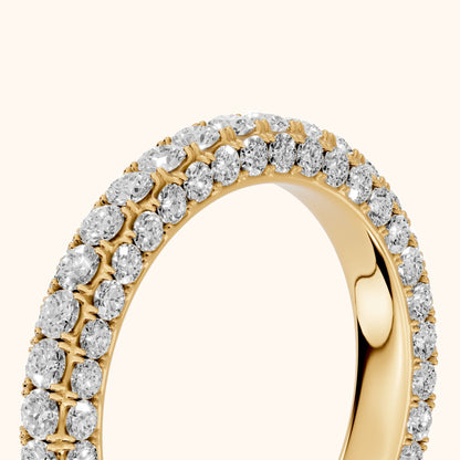 Candela Micropavé Round Diamond Eternity Band in Yellow Gold - slant-view