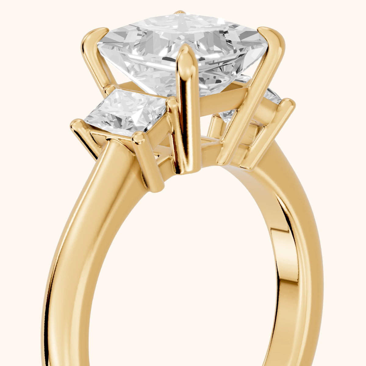 Cosette Statement Three-Stone Princess Diamond Engagement Ring in Yellow Gold - slant-view.webp