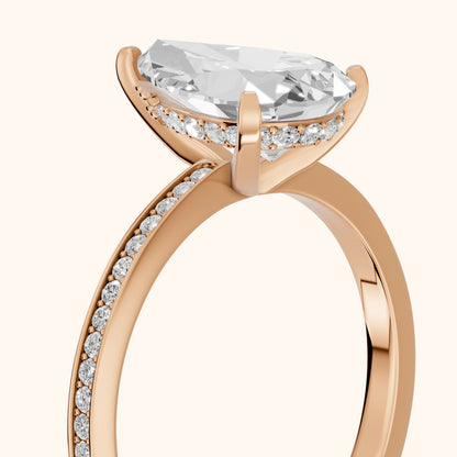 Naia Hidden Halo Pear Diamond Ring in Rose Gold - slant-view.webp
