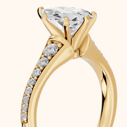 Calista Graduated Pavé Pear Diamond Engagement Ring in Yellow Gold - slant-view.webp
