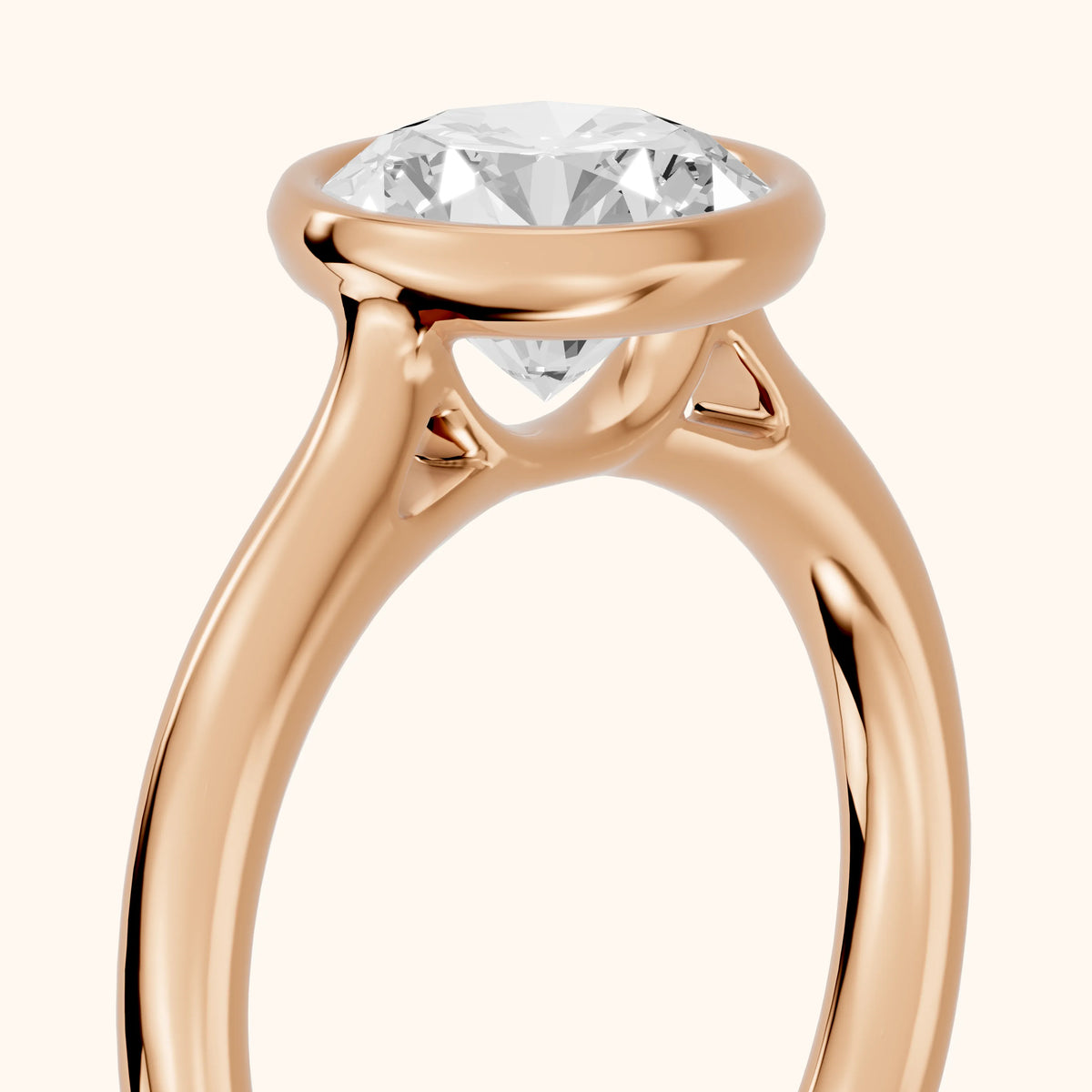 Isla Bezel Solitaire Round Diamond Engagement Ring in Rose Gold - slant-view.webp