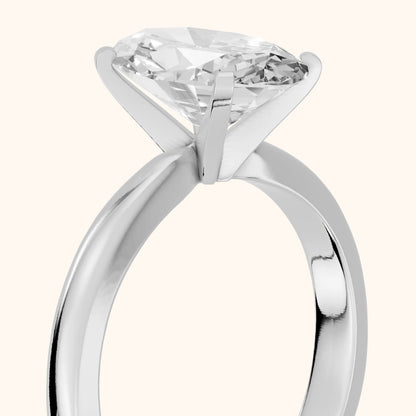 Tamsin Solitaire Knife Edge Oval Diamond Engagement Ring in White Gold - slant-view.webp