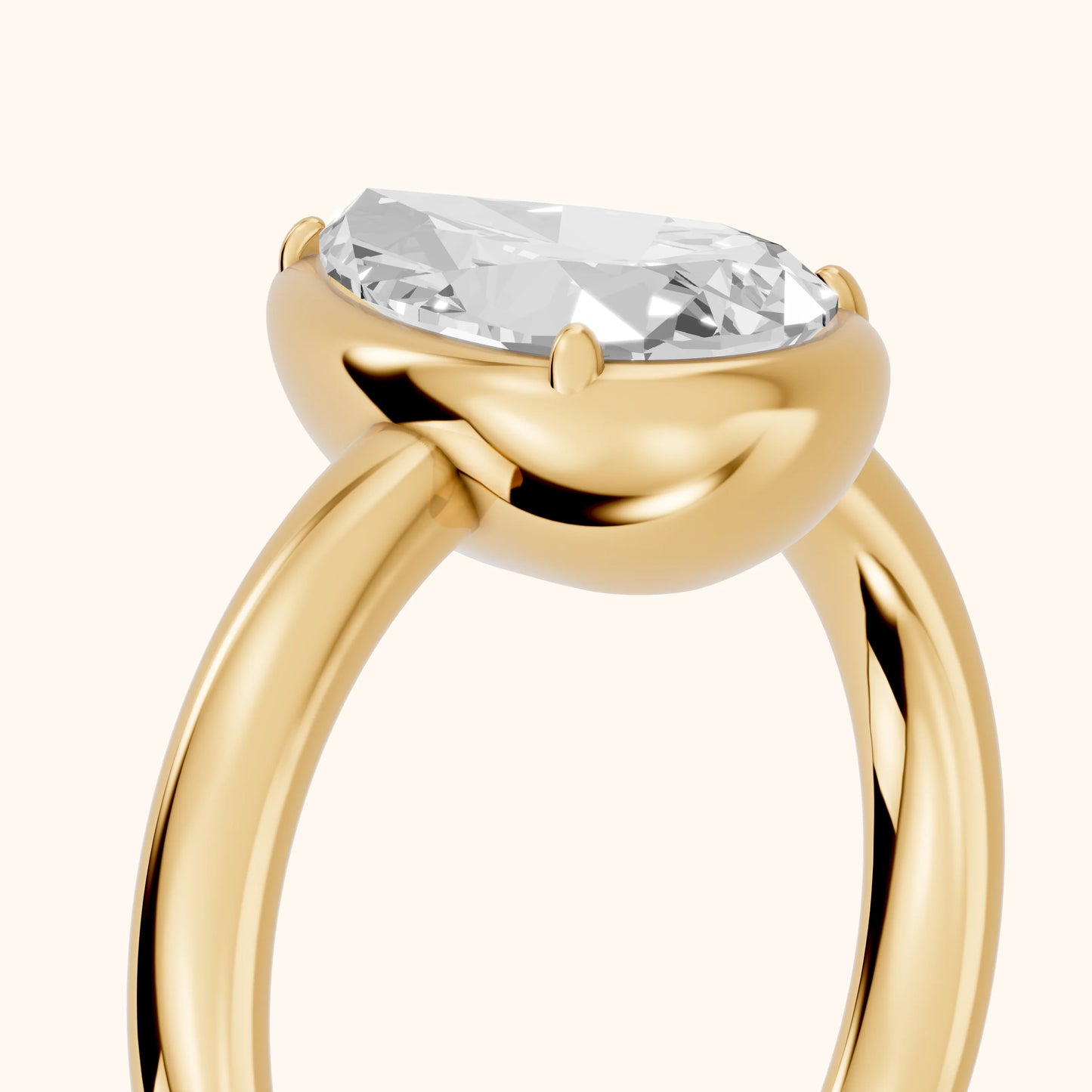 Alina Bezel Solitaire Pear Diamond Ring in Yellow Gold - slant-view.webp