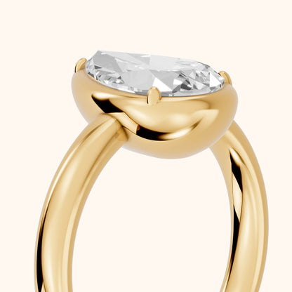 Alina Bezel Solitaire Pear Diamond Ring in Yellow Gold - slant-view.webp