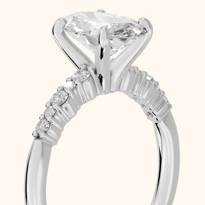 Deirdre Graduated Pavé Oval Diamond Engagement Ring in Platinum - slant-view.webp