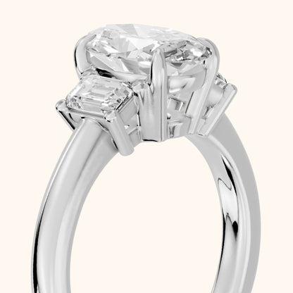 Babette Deco Three-Stone Oval Diamond Engagement Ring in Platinum - slant-view.webp