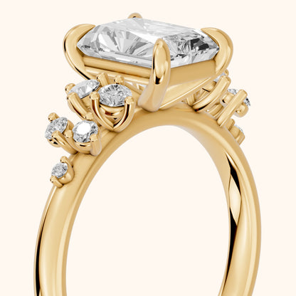 Mirabelle Cluster Radiant Diamond Engagement Ring in Yellow Gold - slant-view.webp