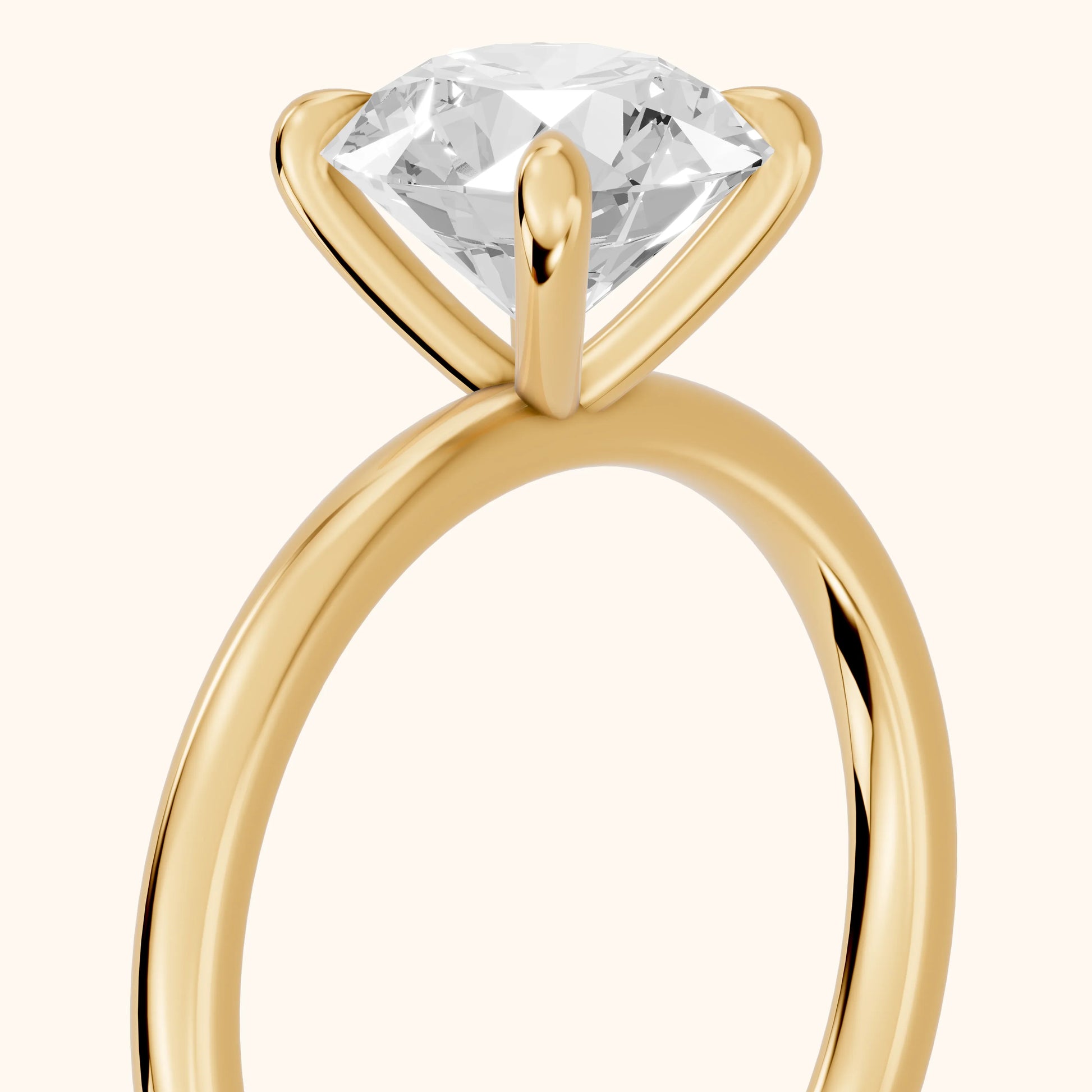 Nella Petite Solitaire Round Diamond Engagement Ring in Yellow Gold - slant-view.webp