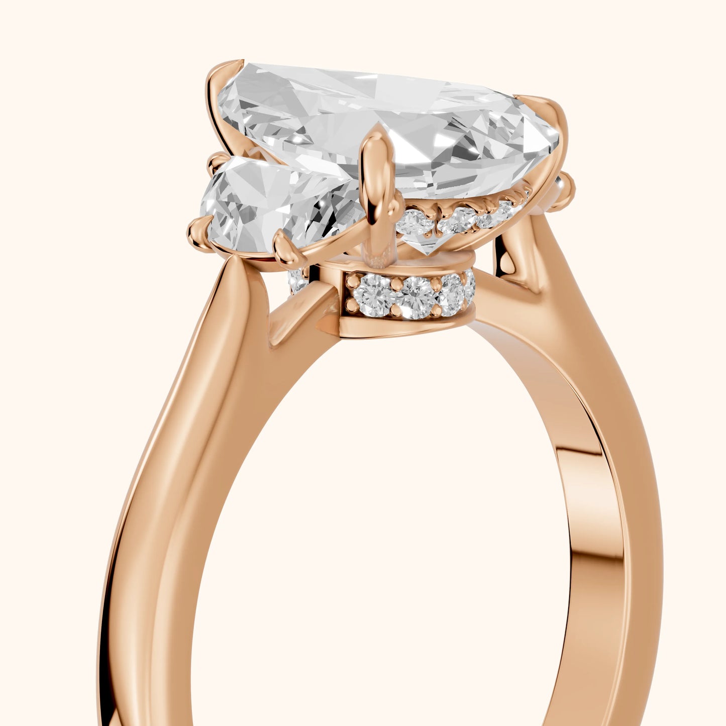 Romy Three-Stone Pear Diamond Engagement Ring in Rose Gold - slant-view.webp