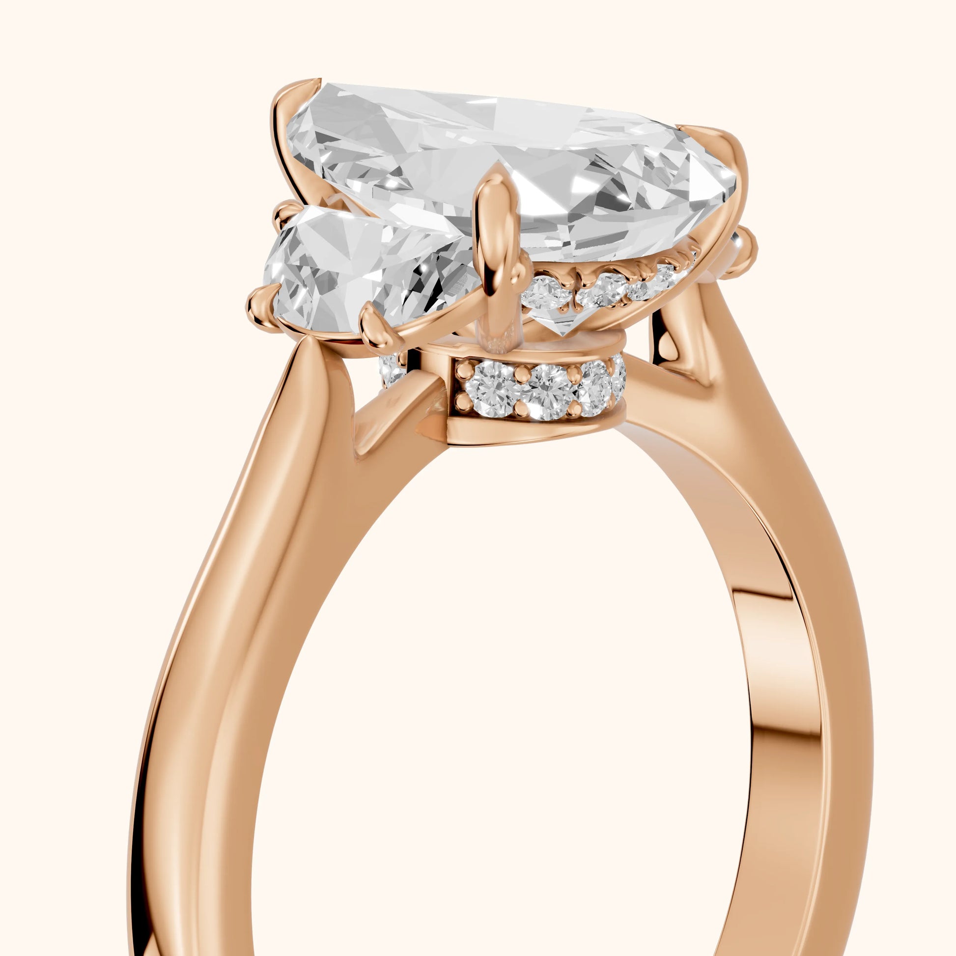 Romy Three-Stone Pear Diamond Engagement Ring in Rose Gold - slant-view.webp