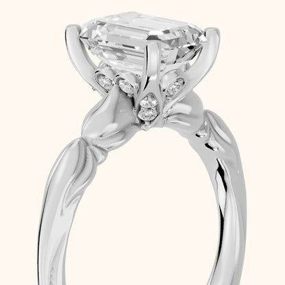 Verena Engraved Leaf Emerald Diamond Engagement Ring in Platinum - slant-view.webp