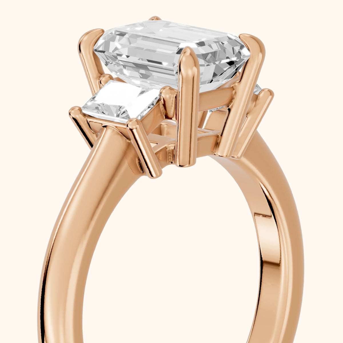 Cosette Statement Three-Stone Emerald Diamond Engagement Ring in Rose Gold - slant-view.webp