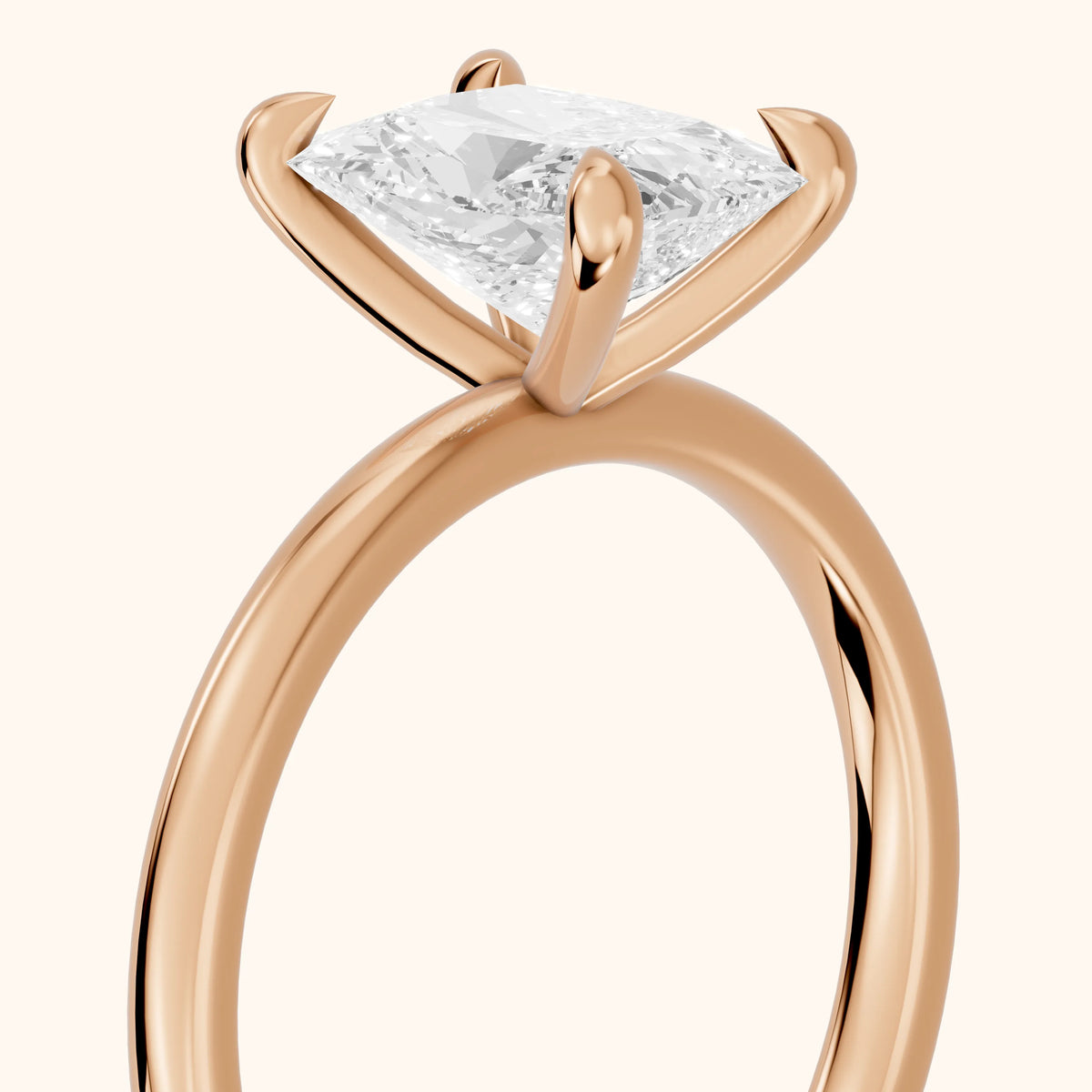 Nella Petite Solitaire Radiant Diamond Engagement Ring in Rose Gold - slant-view.webp