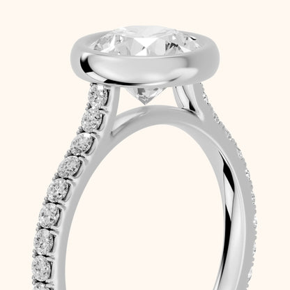 Cora Bezel Pavé Round Diamond Ring in Platinum - slant-view.webp