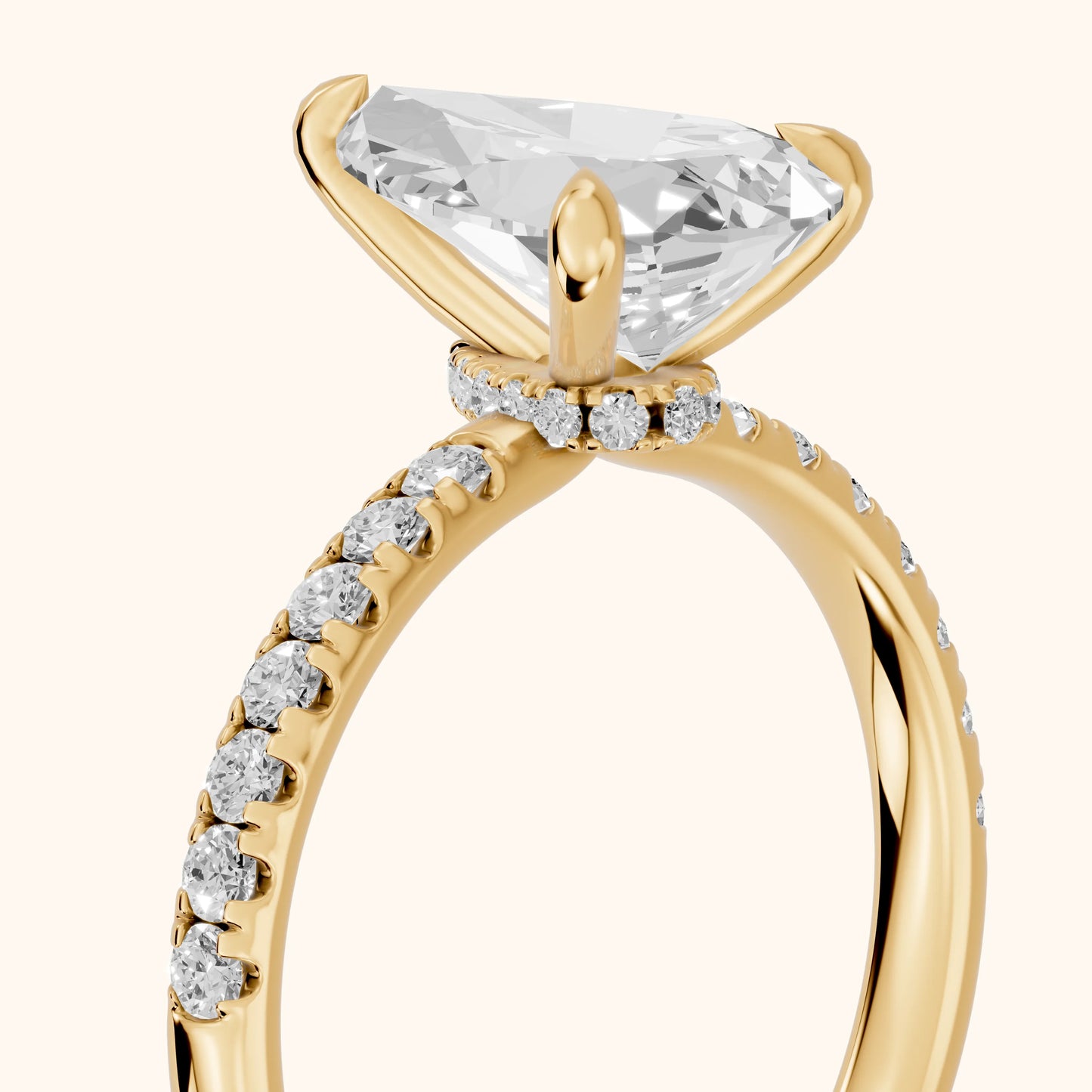 Maya Hidden Halo Pavé Pear Diamond Engagement Ring in Yellow Gold - slant-view.webp