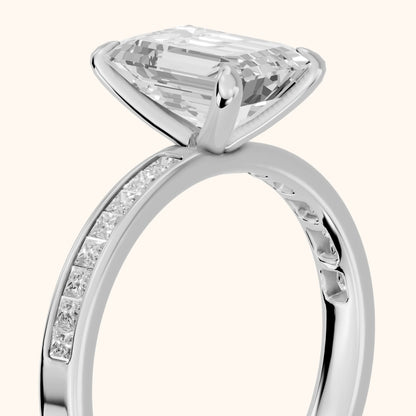 Maren Sidestone Channel Set Emerald Diamond Engagement Ring in White Gold - slant-view.webp