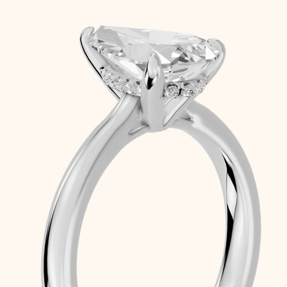 Mena Hidden Halo Pear Diamond Engagement Ring in Platinum - slant-view.webp