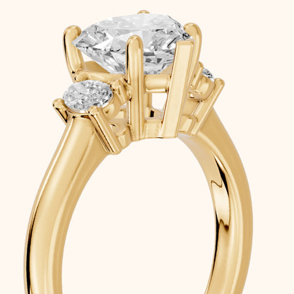 Alya Three-Stone Cathedral Heart Diamond Engagement Ring in Yellow Gold - slant-view.webp