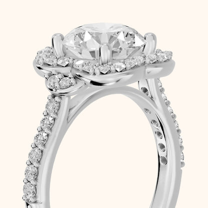 Amy Floral Halo Round Diamond Engagement Ring in Platinum - slant-view.webp