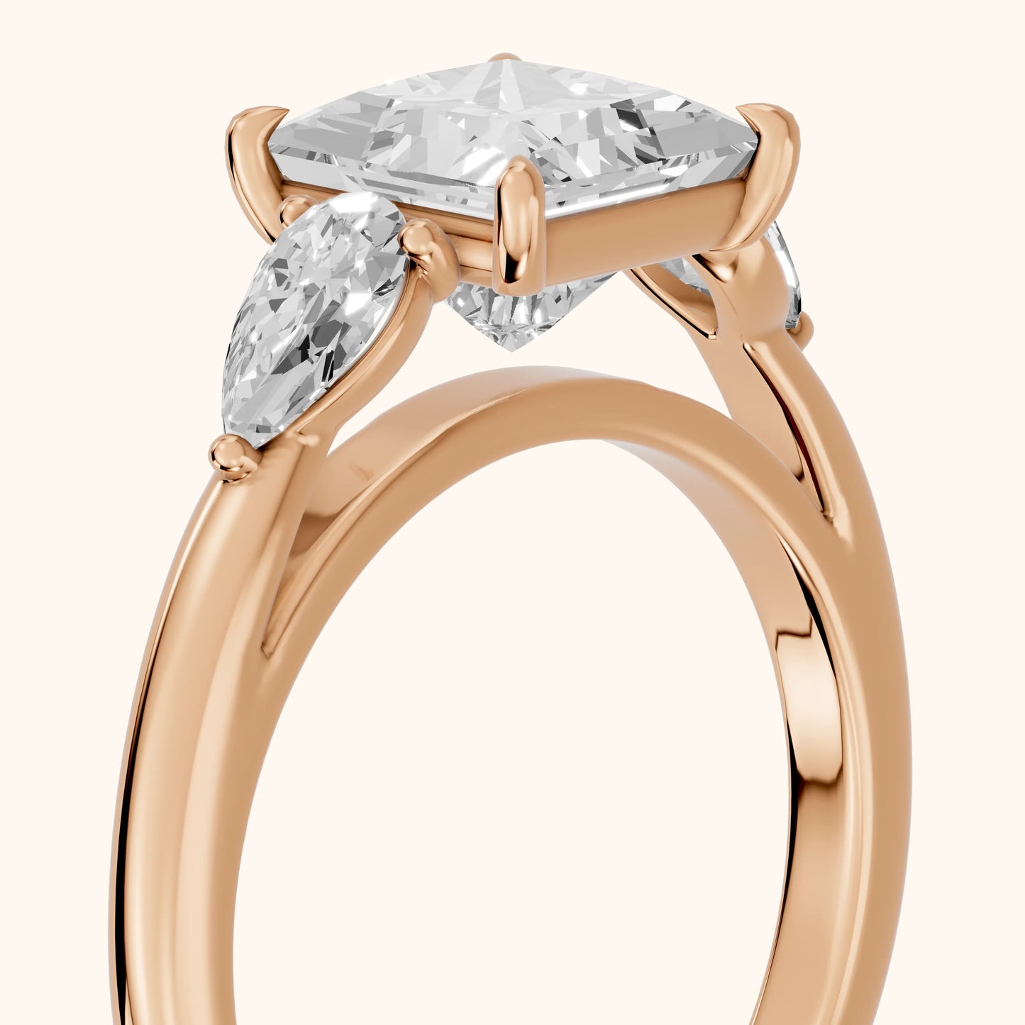 Phoebe Three-Stone Princess Diamond Ring in Rose Gold - slant-view.webp
