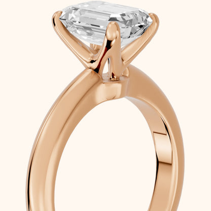 Clementine Solitaire Emerald Diamond Engagement Ring in Rose Gold - slant-view.webp