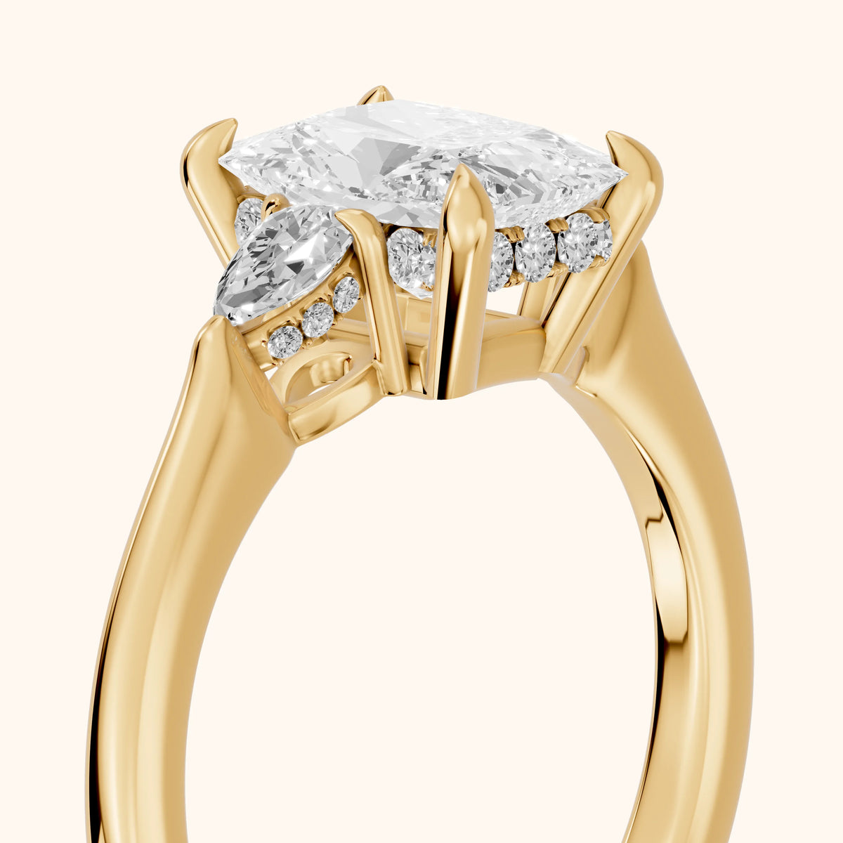 Leila Three-Stone Radiant Diamond Engagement Ring in Yellow Gold - slant-view.webp