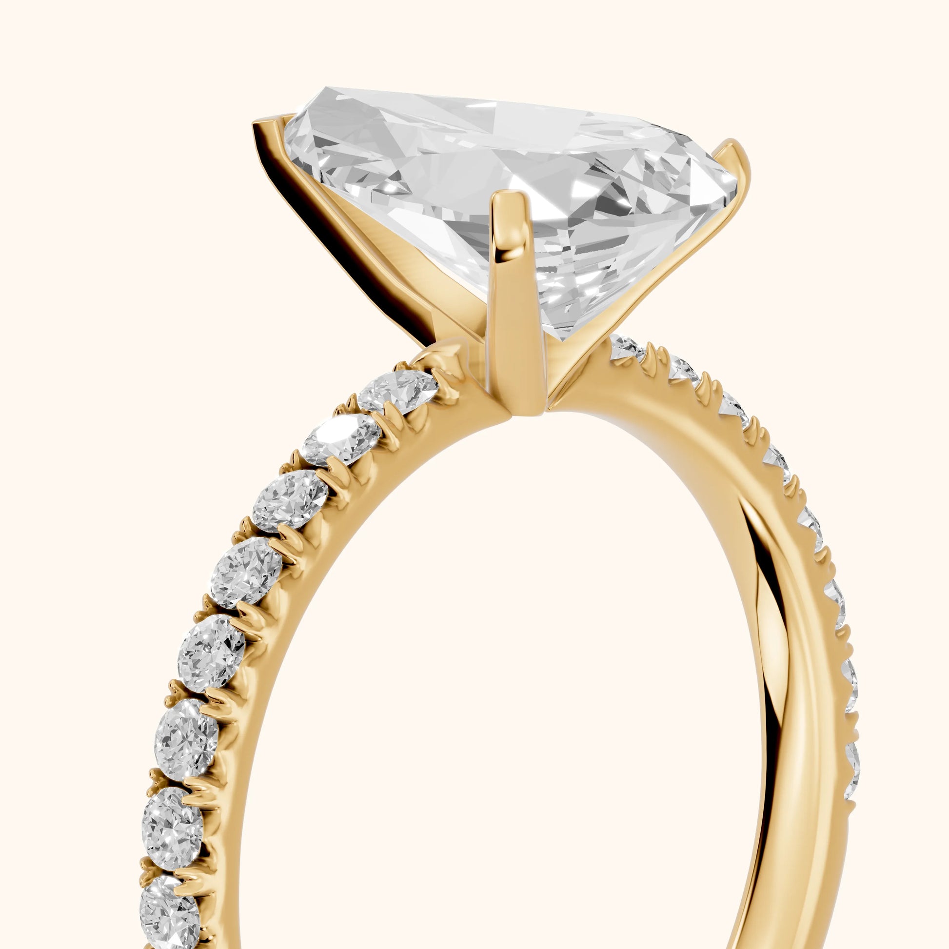 Juna French Pavé Solitaire Pear Diamond Engagement Ring in Yellow Gold - slant-view.webp