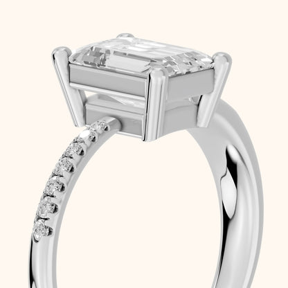 Rosie Solitaire Basket Emerald Diamond Engagement Ring in Silver - slant-view.webp