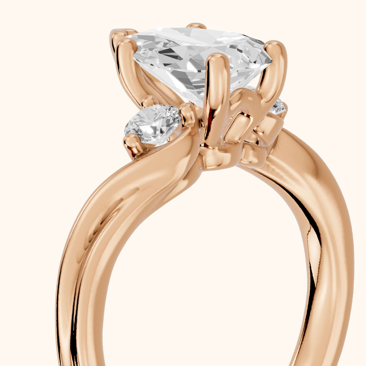 Rena Bypass Three-Stone Pear Diamond Engagement Ring in Rose Gold - slant-view.webp