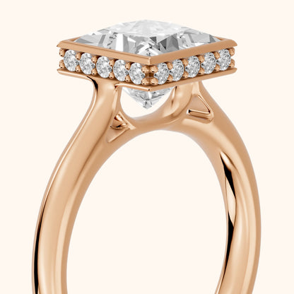 Nicolette Hidden Halo Bezel Princess Diamond Engagement Ring in Rose Gold - slant-view.webp