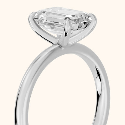 Susan Solitaire Emerald Diamond Engagement Ring in Platinum - slant-view.webp