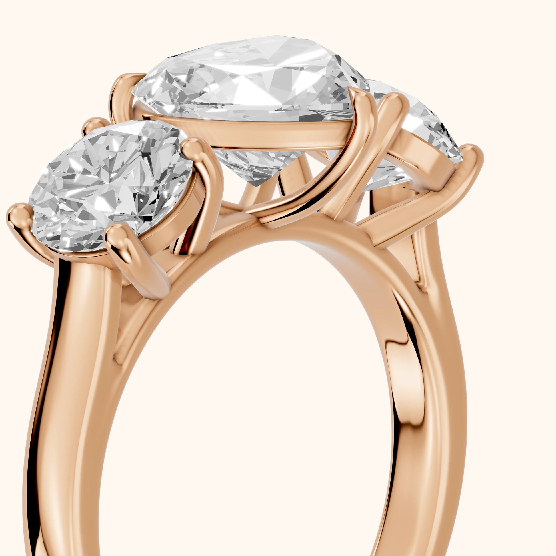 Esme Three-Stone Tapered Heart Diamond Ring in Rose Gold - slant-view.webp