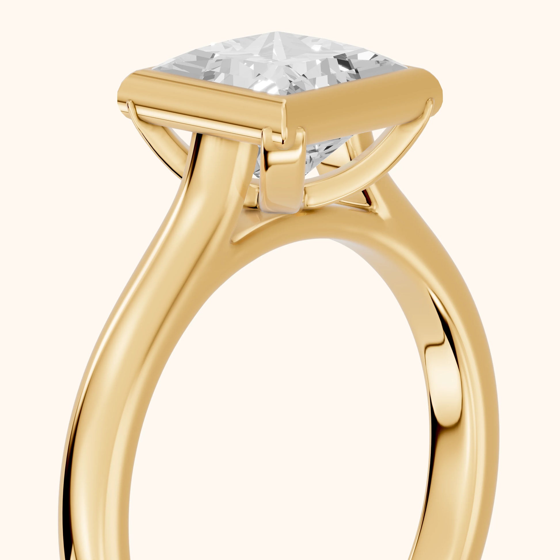 Jolie Bezel Solitaire Princess Diamond Engagement Ring in Yellow Gold - slant-view.webp