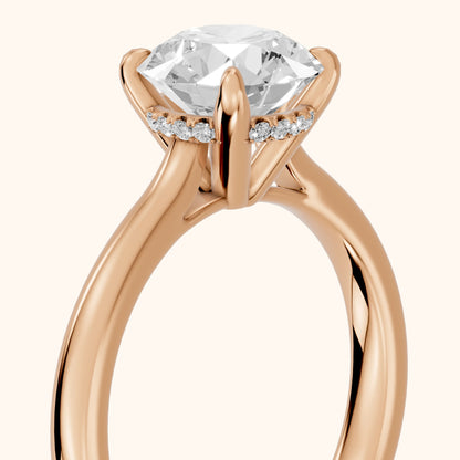Mena Hidden Halo Round Diamond Engagement Ring in Rose Gold - slant-view.webp
