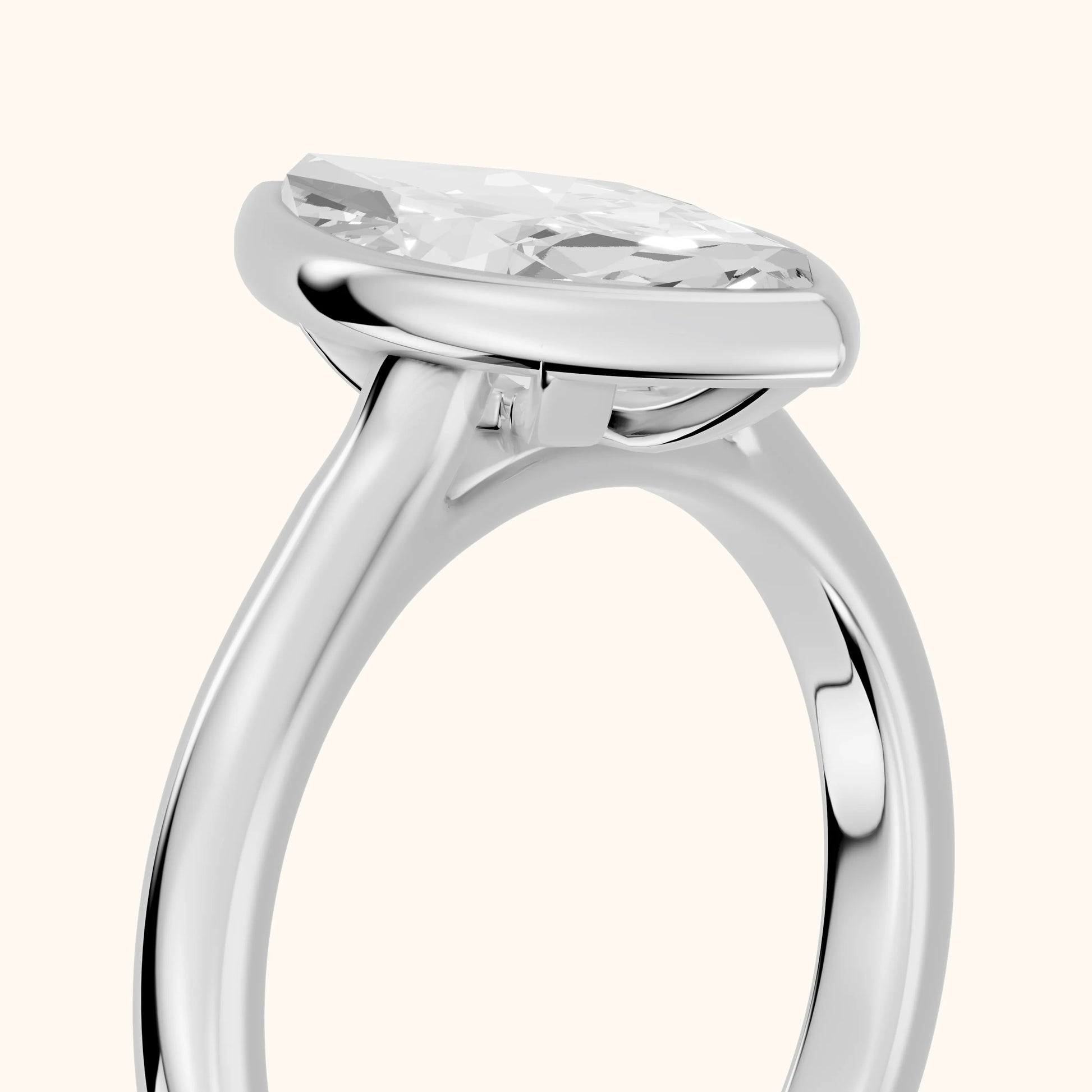Jolie Bezel Solitaire Marquise Diamond Engagement Ring in Platinum - slant-view.webp